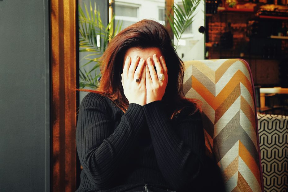 Women frustrated with making mistakes in her marketing.